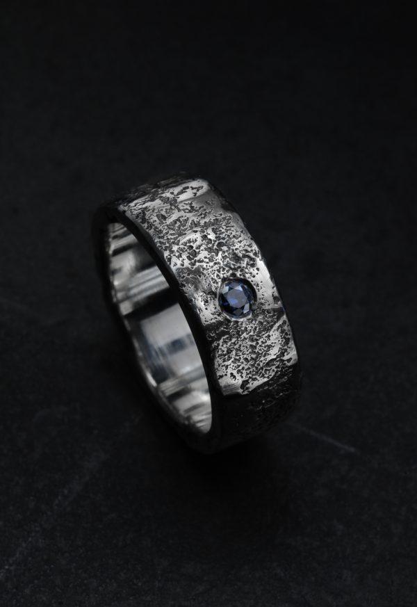 Photo blue moissanite ring.